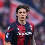 Riccardo Calafiori celebrates Bologna's Coppa Italia win over Milan
