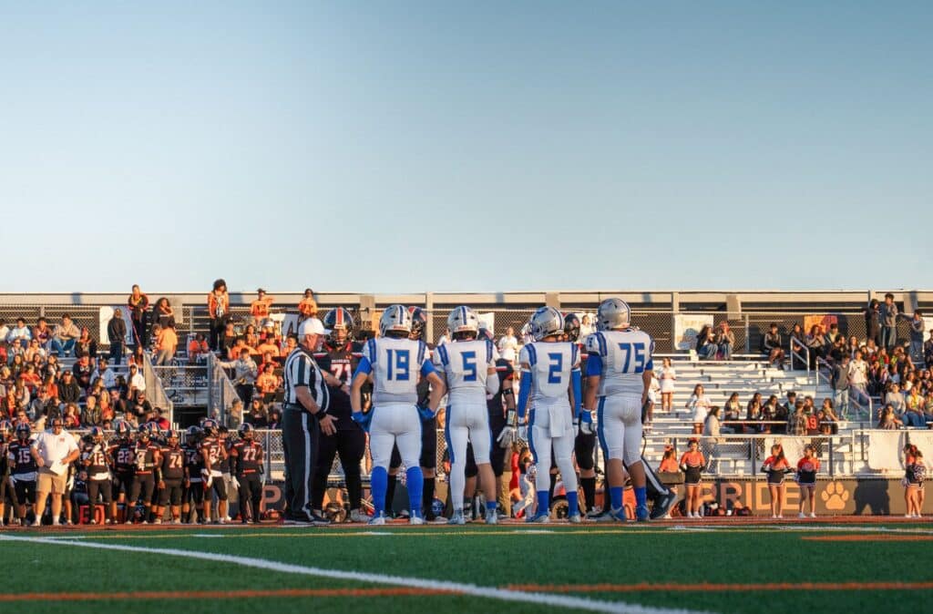 Football stadium filled with spectators during a game