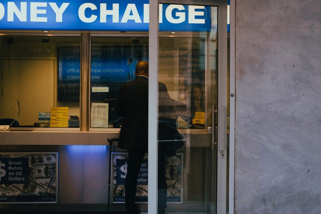 A bank counter setting representing a wire transfer transaction