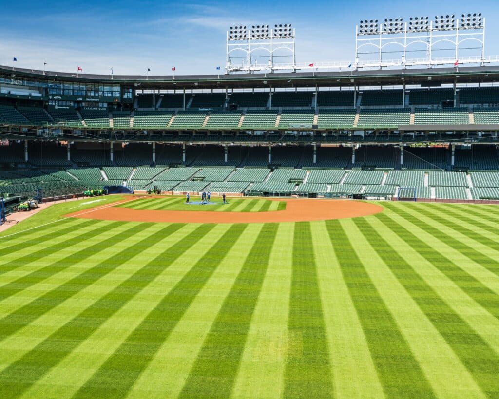 Empty baseball stadium field viewed from the stands under daylight