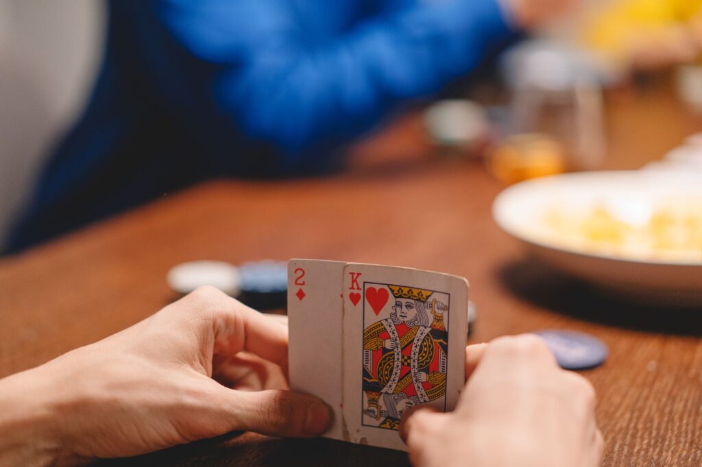 Casino chips and playing cards arranged on a table