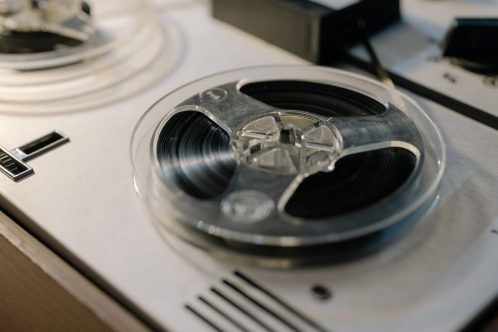 Close-up of a lit slot machine screen with spinning reels
