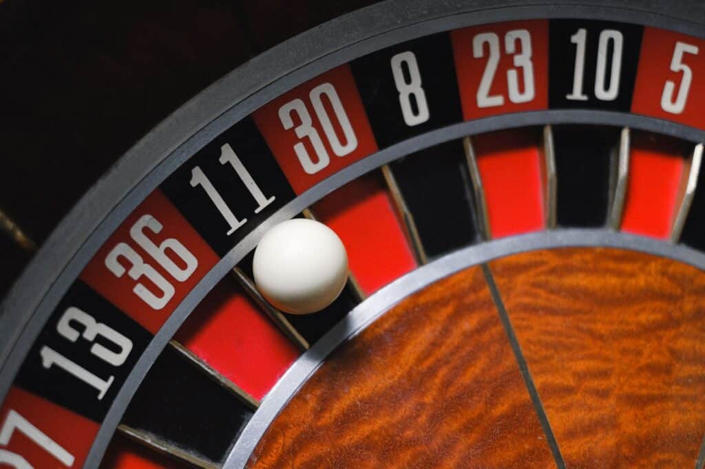 Close-up of a roulette wheel on a casino table