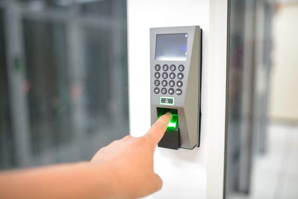 Person using biometric fingerprint authentication on a smartphone