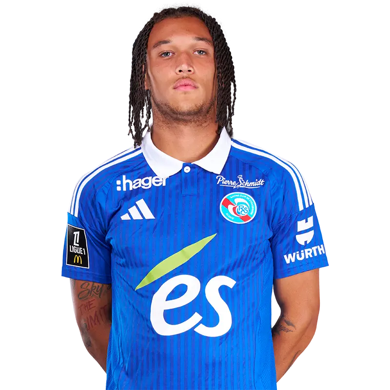 Diego Moreira posing in a blue RC Strasbourg football kit against a white background